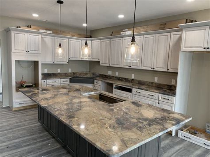 Can I replace my kitchen cabinets and keep my granite countertops?