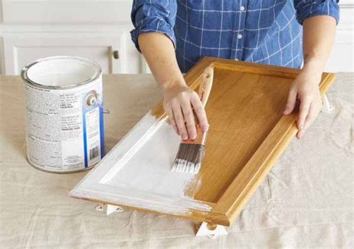 Can you put primer over painted wood?