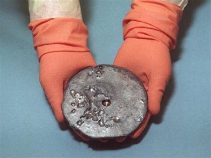 Can you touch uranium?