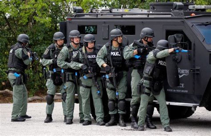 Do SWAT members wear masks?