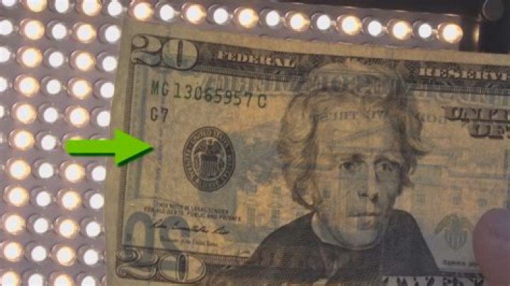 How can a UV light detect counterfeit bills?