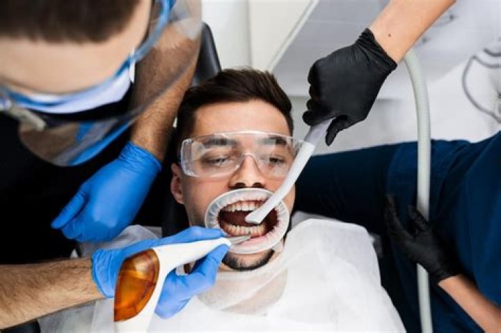 How can I clean my teeth like a hygienist?