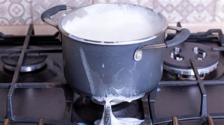 How do you boil milk without curdling?