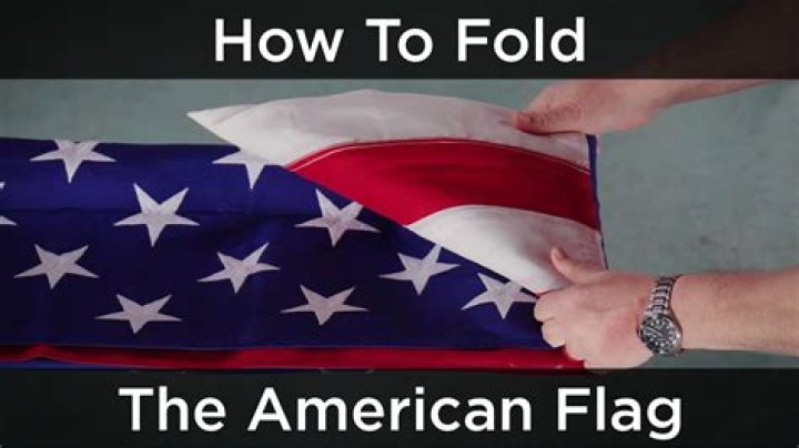How do you present a folded flag?