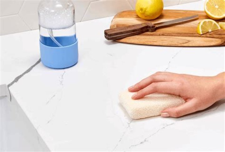 How do you prevent water spots on quartz countertops?