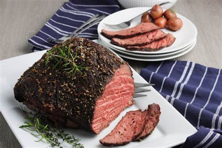 How do you reheat a roast beef without drying it out?