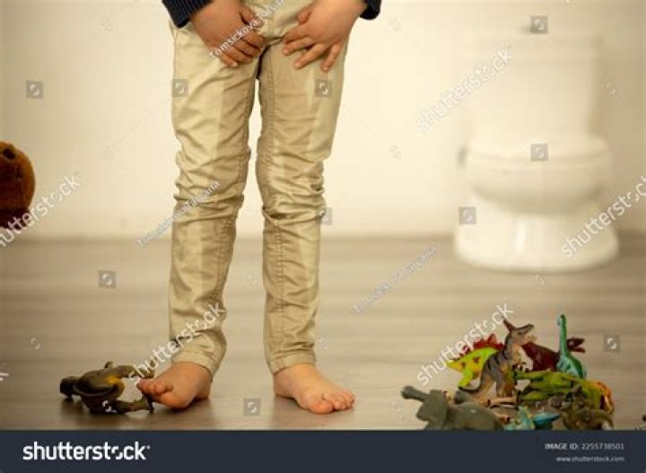 How do you teach a toddler boy to pee?