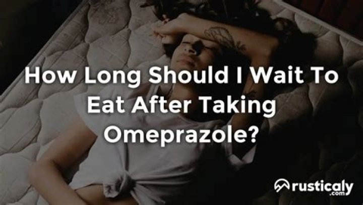 How long should I wait to eat after taking omeprazole?