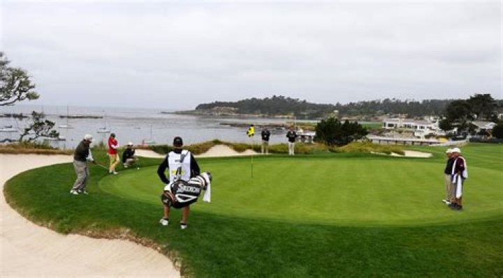 How much does it cost to play golf at Pebble Beach?