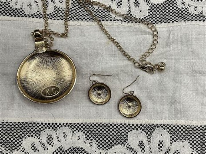 What is KC stamped on jewelry?