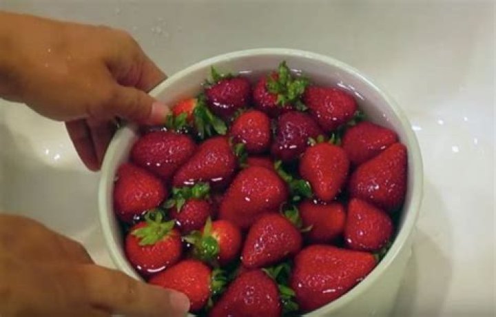 What should you soak strawberries in?