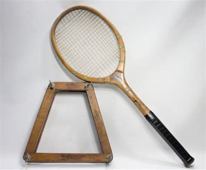 Who was the last to play with a wooden tennis racket?