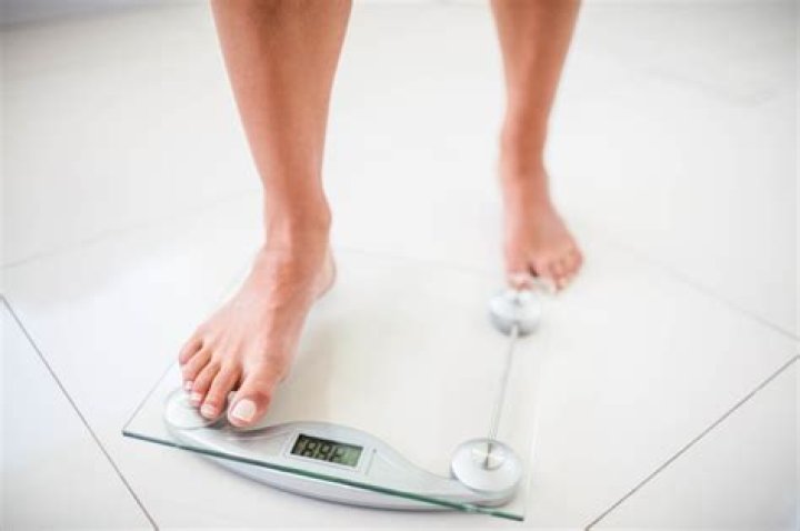 Why do you weigh less after a shower?