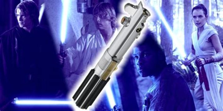 Why does Rey bury Luke and Leia's lightsaber?