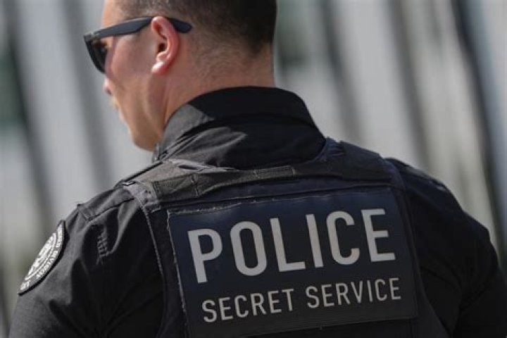Why does the Secret Service talk into their sleeves?