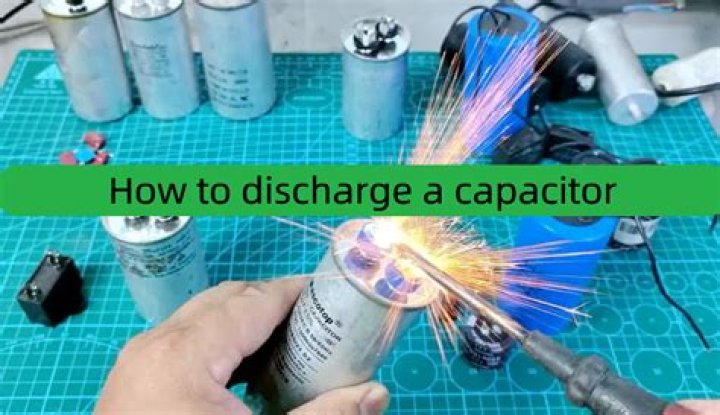Why is it necessary to discharge a capacitor?